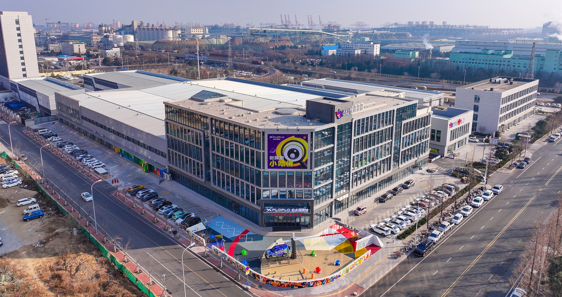 Aerial overview of the DEEPBLUE factory campus with production workshops behind the front exploration museum Aerial overview of the DEEPBLUE factory campus with production workshops behind the front exploration museum