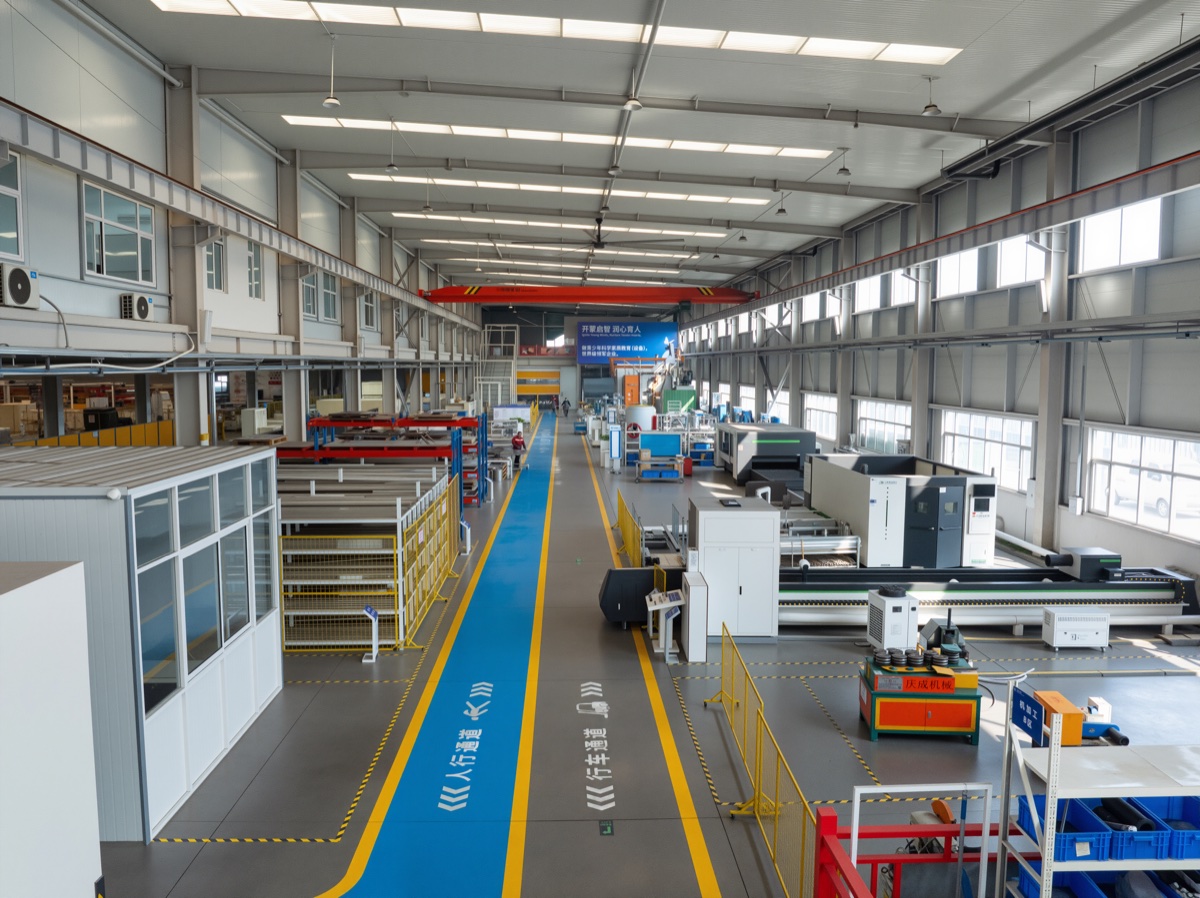 Long-view DEEPBLUE production hall with blue pedestrian lanes and advanced processing equipment Long-view DEEPBLUE production hall with blue pedestrian lanes and advanced processing equipment