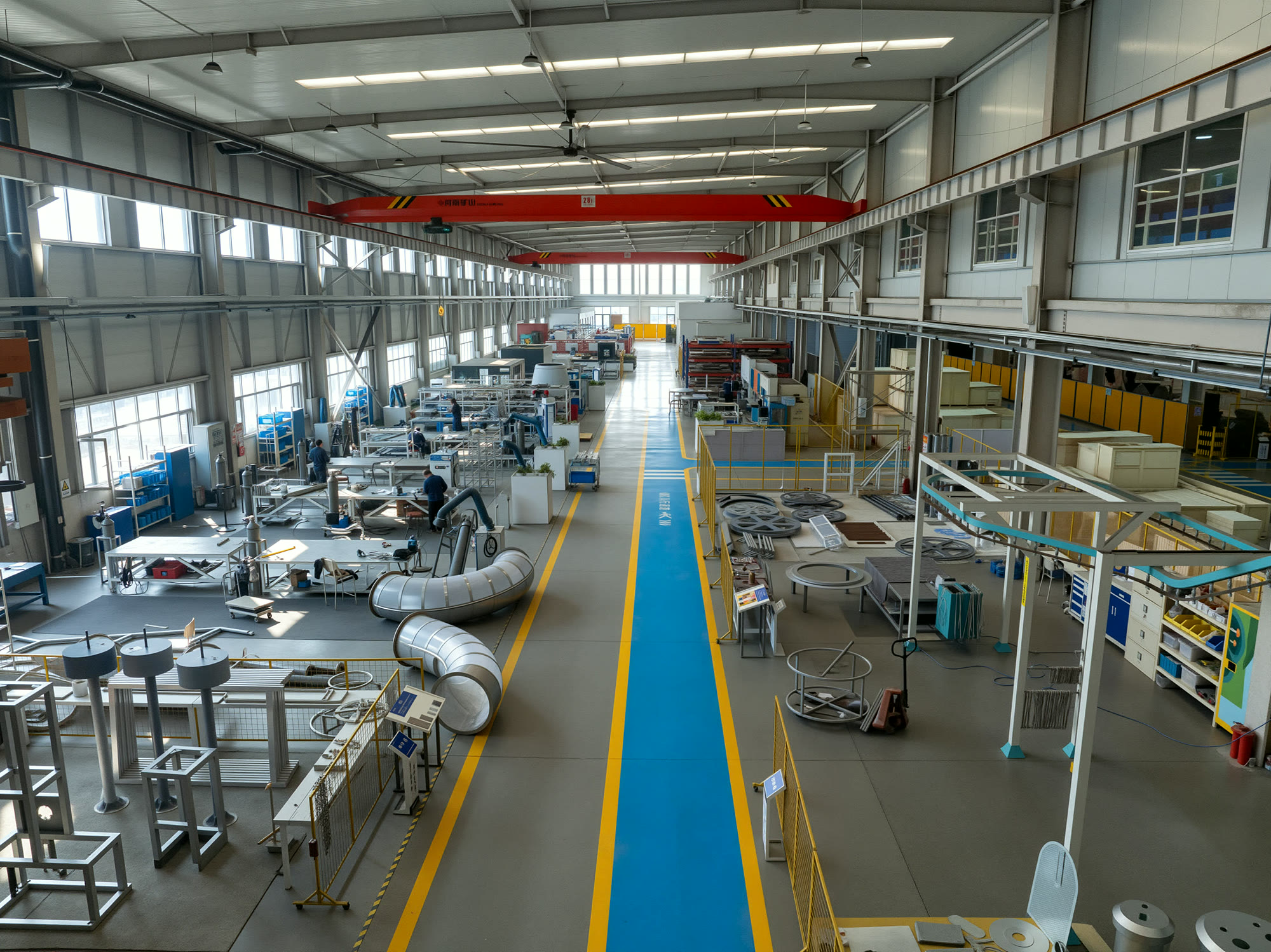Interactive museum exhibit manufacturing inside the DEEPBLUE factory Wide view of a DEEPBLUE workshop used to manufacture and assemble interactive exhibits