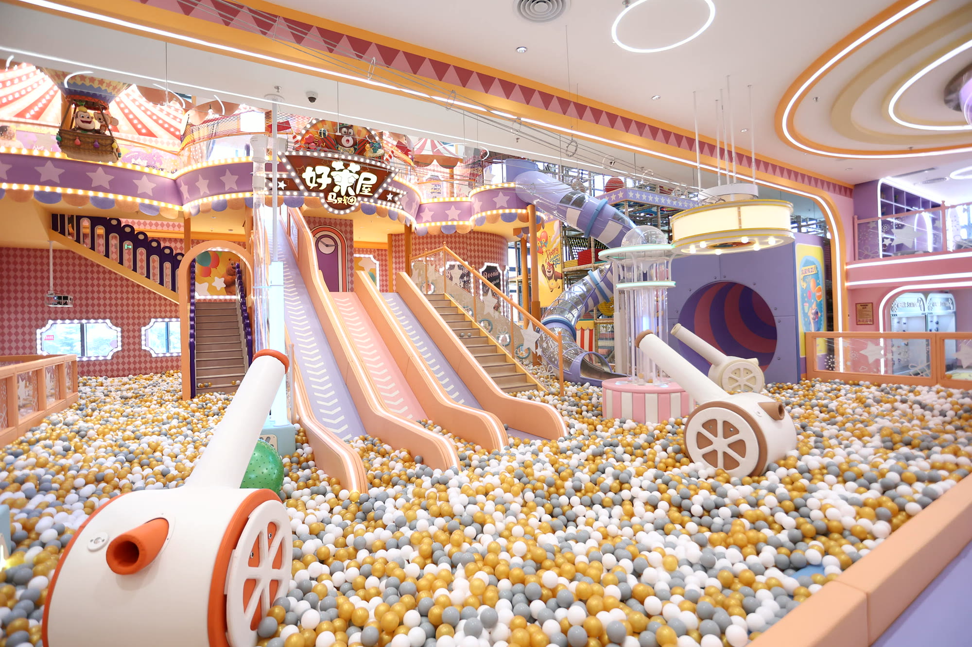 Indoor children's playground with custom climbing and play equipment