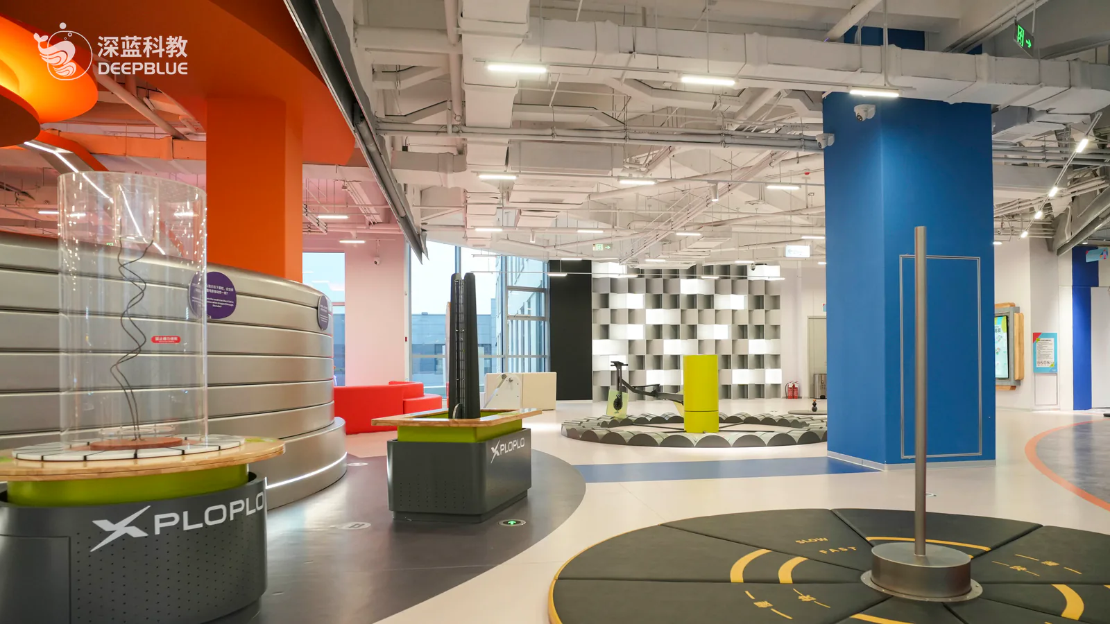 XPLOPLO second-floor Energy and Light gallery with hands-on science exhibits inside DEEPBLUE's operating children's exploration museum