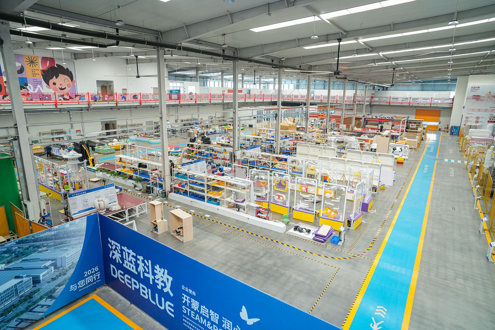 Panoramic view of DEEPBLUE's exhibit assembly workshop and blue logistics aisles